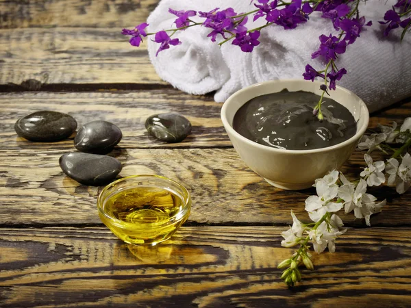 Black healing clay for Spa treatments — Stock Photo, Image